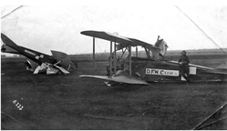 Damaged aeroplanes used by the Aviation School in Ławica: the reconnaissance aircraft - DFW C.V No. 2019/17 (Ławica Air Base No. 220/17) and the training aircraft Albatros B.IIa No. 1300/17 (No.: SLŁ 53/17). Standing on the left: Jan Jasiewicz – a pilot brought to Greater Poland by Colonel Gustaw Macewicz. Photograph taken in Ławica in 1919, from the collection of R. Kulczyński SDB